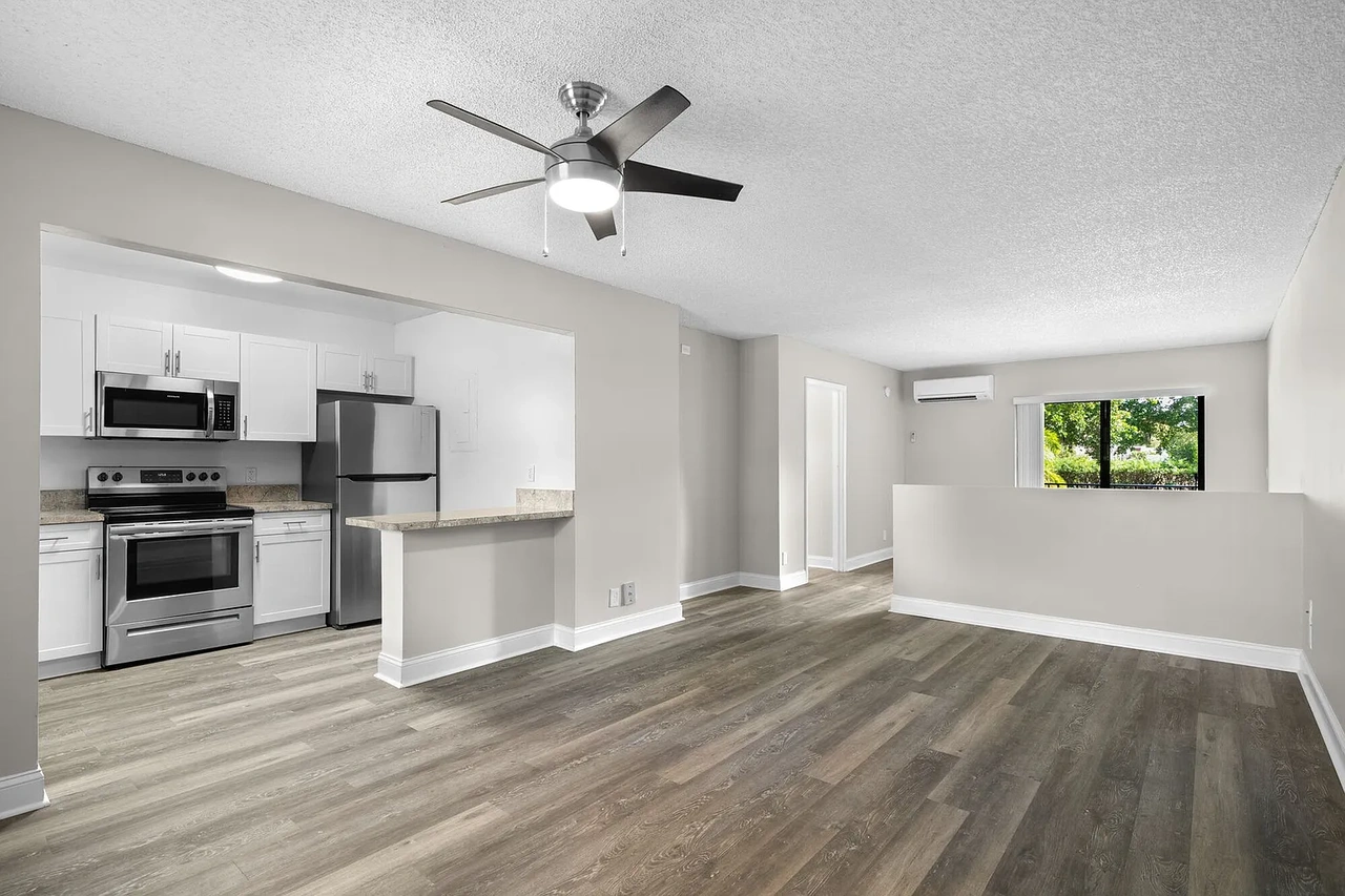 Open-plan wood-look flooring project in Cooper City