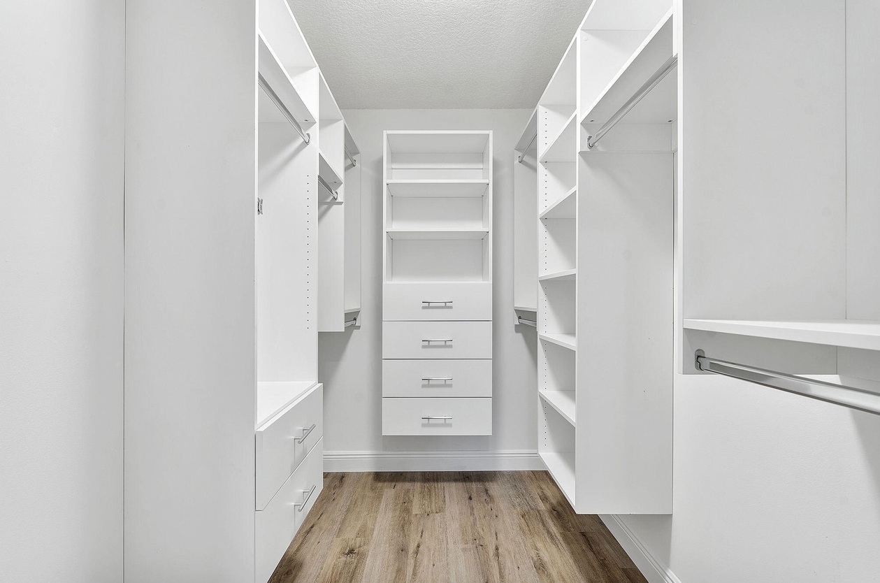 Custom white walk-in closet in Dania Beach
