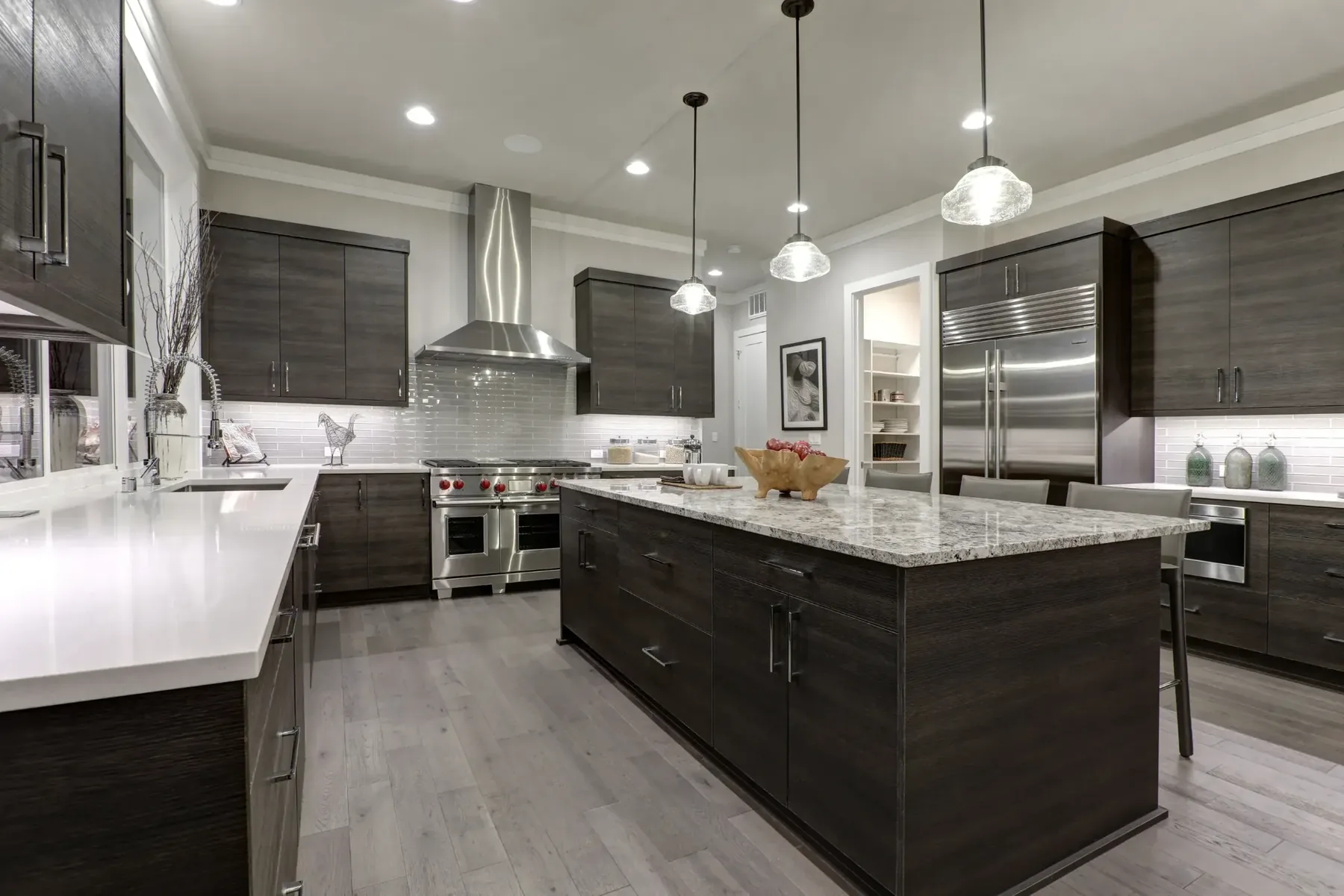 Dark luxury kitchen remodel with custom cabinetry in Miami